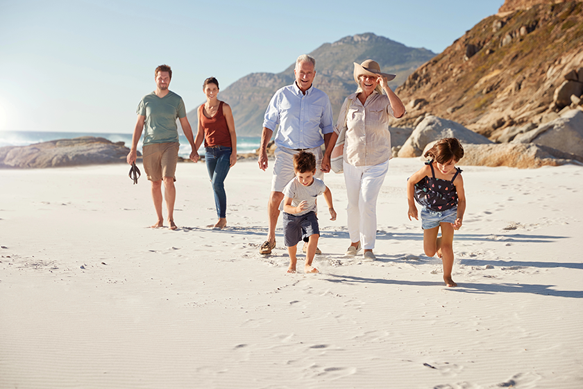 three generation white family walking
