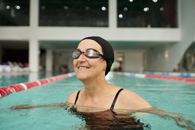 positive middle aged woman swim cap goggles swimming pool positive middle aged woman swim cap goggles swimming pool