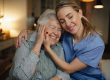 caring healthcare worker visiting senior patient