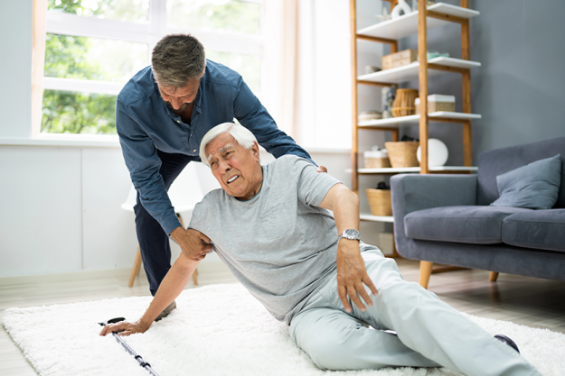 helping elder senior fallen man helping elder senior fallen man