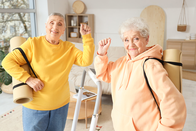 senior female friends fitness mats senior female friends fitness mats