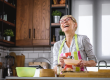 beautiful senior woman making dough