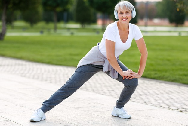 happy positive mature sportswoman