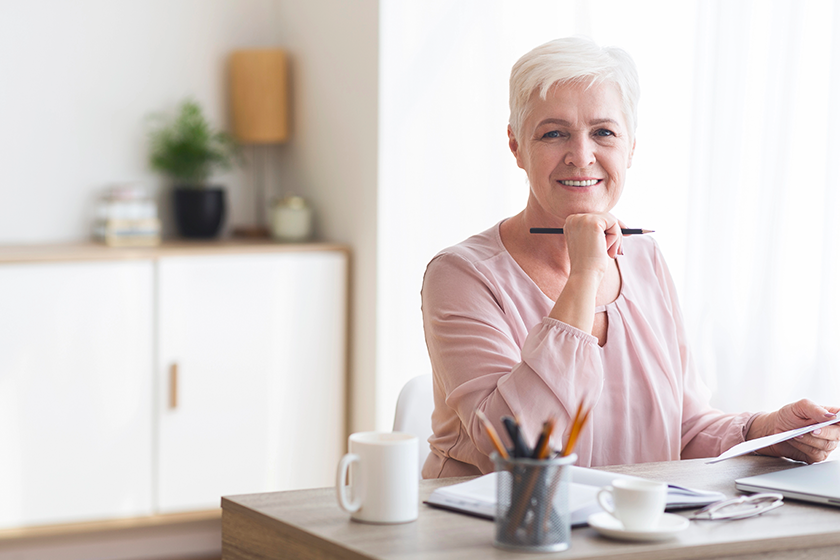 happy senior business woman working