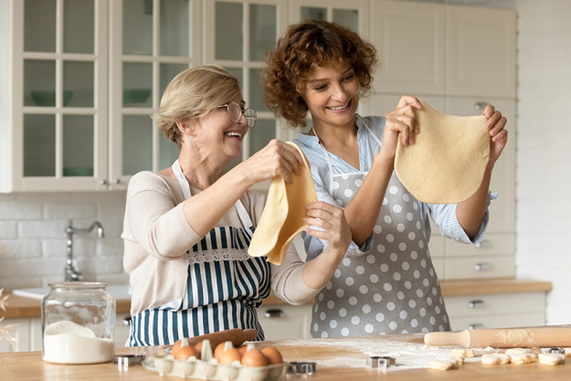 happy young woman with mature mother
