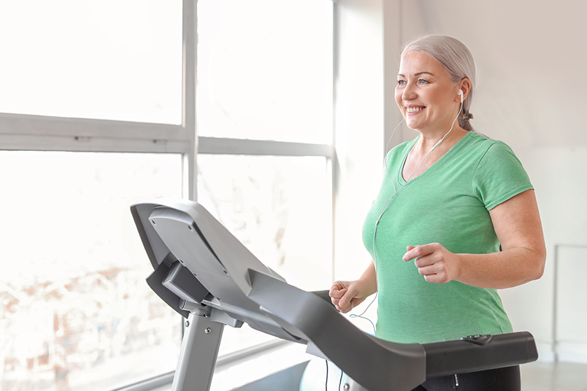 sporty mature woman treadmill sporty mature woman treadmill