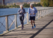 active senior couple jogging together