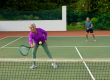 biracial active senior woman senior man playing