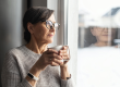close up portrait of senior older woman wearing glasses