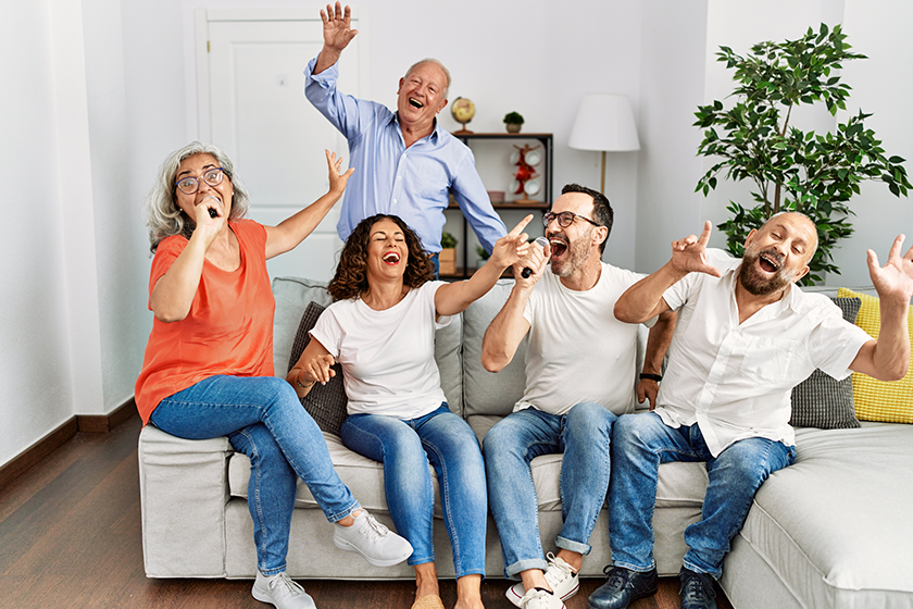 group middle age friends having party singing song group middle age friends having party singing song