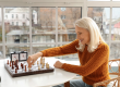 mature woman her husband playing chess