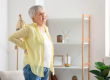 senior woman shirt suffering back pain